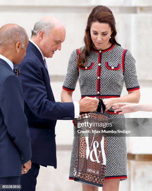 Catherine, Duchess of Cambridge receives a V&A gift bag visits the new V&A Exhibition Road Quarter at the Victoria & Albert Museum on June 29, 2017...