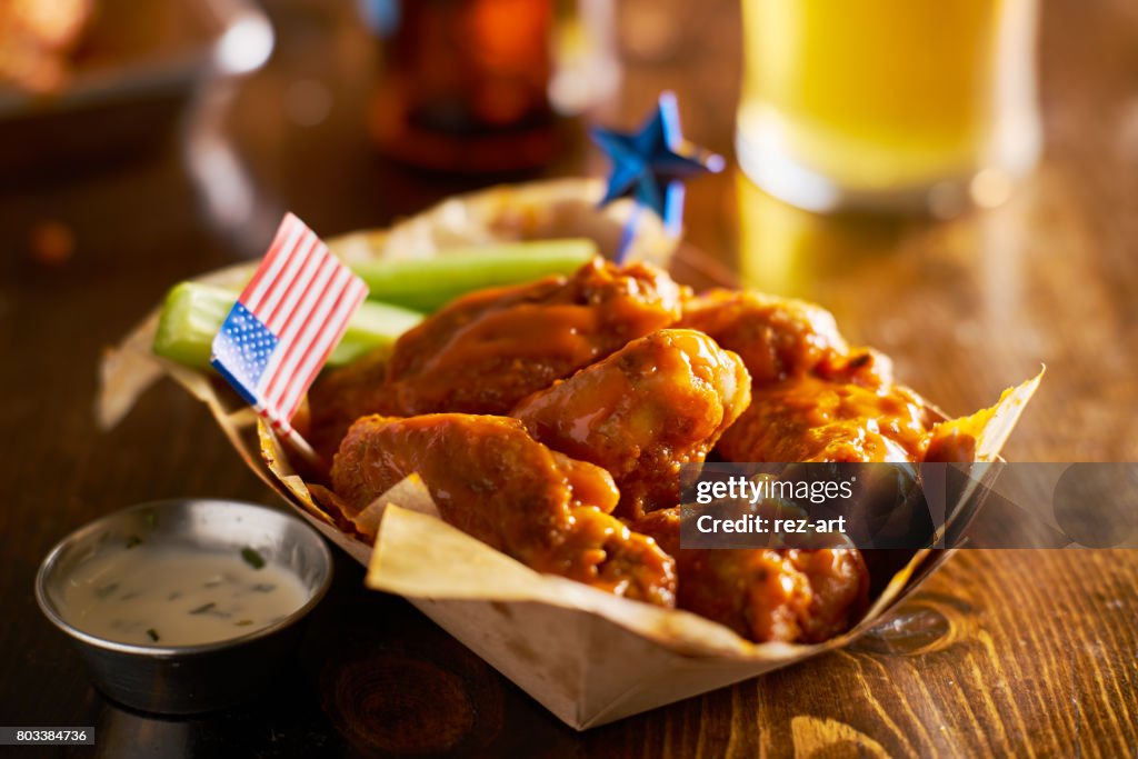 Buffalo chicken wings with patriotic 4th of july theme and american flag