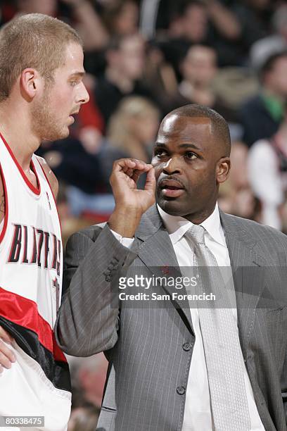 Head coach Nate McMillan of the Portland Trail Blazers talks to Joel Przybilla during the game against the Minnesota Timberwolves on March 15, 2008...