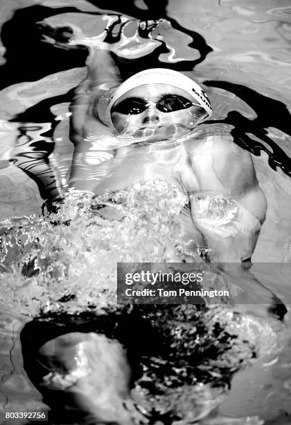 Ryan Murphy competes in a Men's 50 LC Meter Backstroke heat race during the 2017 Phillips 66 National Championships & World Championship Trials at...