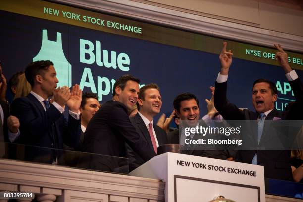 Matthew Wadiak, co-founder and chief operating officer of Blue Apron Holdings Inc., left of center, Matt Salzberg, co-founder and chief executive...