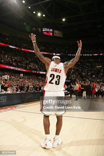 LeBron James of the Cleveland Cavaliers responds to the fans' applause during a time-out to celebrate his surpassing Brad Daugherty, formerly of the...