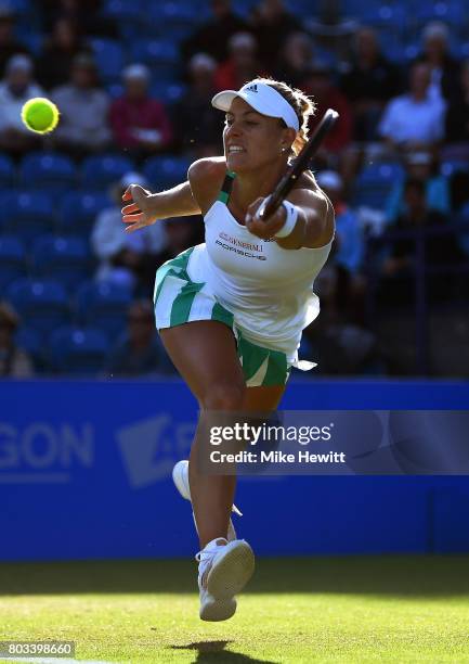 Angelique Kerber of Germany hits a forehand during the ladies singles quarter final match against Johanna konta of Great Britain on day five of the...