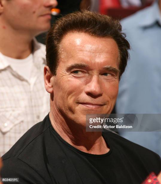 Governor Arnold Schwarzenegger attends the game between the Washington Wizards and the Miami Heat on February 21, 2008 at the American Airlines Arena...