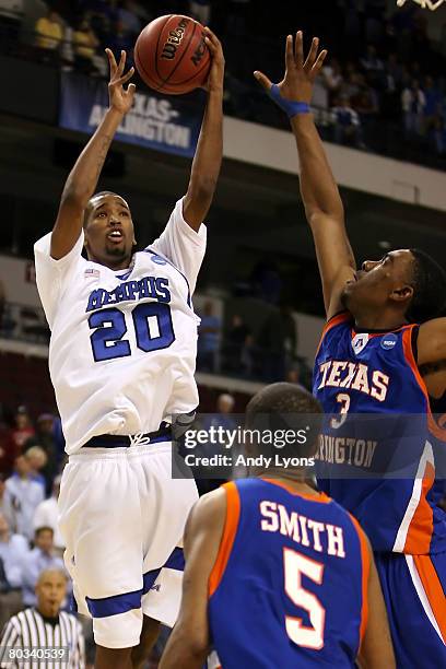 Doneal Mack of the Memphis Tigers shoots over Jermaine Griffin of the Texas-Arlington Mavericks during the first round of the South Regional as part...