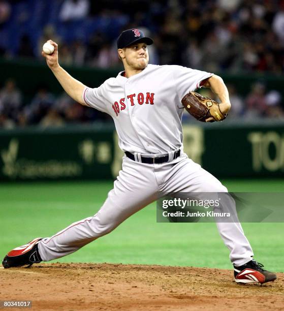 Pitcher Jonathan Papelbon of Boston Red Sox pitches during preseason friendly between Boston Red Sox and Hanshin Tigers at Tokyo Dome on March 22,...