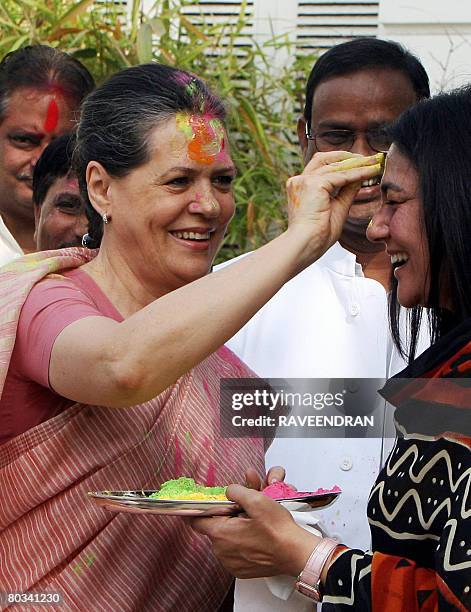 Chairperson of the Congress-led UPA government and Congress Party President Sonia Gandhi celebrates "Holi" with party supporters in New Delhi on...