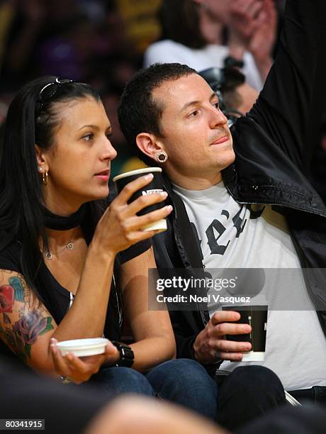 Chester Bennington and his wife Talinda Bentley attend the Los Angeles Lakers vs Seattle Supersonics at the Staples Center on March 21, 2008 in Los...