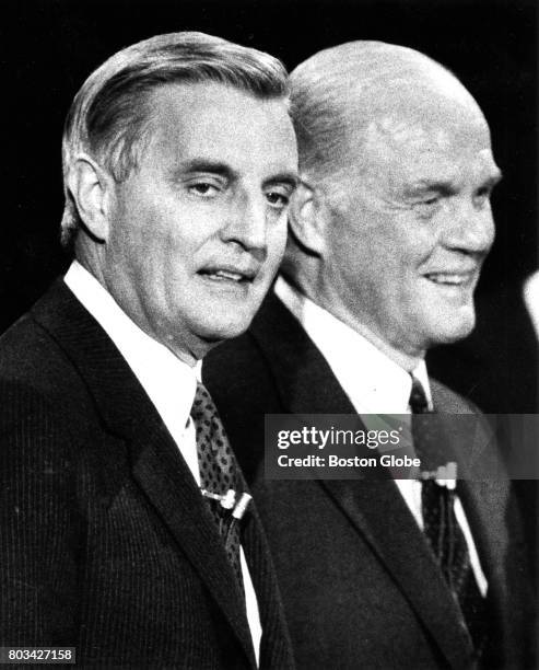 Presidential candidates Walter Mondale, left, and John Glenn stand side by side before the start of a Democratic party presidential debate at Saint...