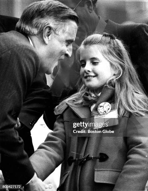 Presidential candidate Walter Mondale greets Carrie Giardino of South Yarmouth, winner of her school's race for class president, during a campaign...