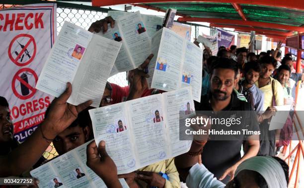 Devotees stand in a queue on the second day of Amarnath Yatra at Base Camp, on June 29, 2017 in Jammu, India. The annual pilgrimage to the holy...