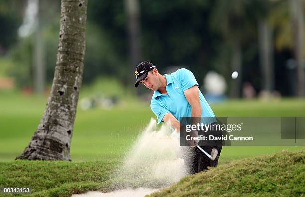 Geoff Ogilvy of Australia plays his second shot at the 2nd hole during the third round of the 2008 World Golf Championships CA Championship at the...