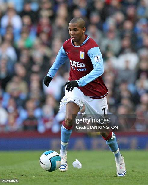 Ashley Young of Aston Villa runs with the ball during the Barclays Premiership football game against Sunderland at Villa Park in Birmingham, on March...