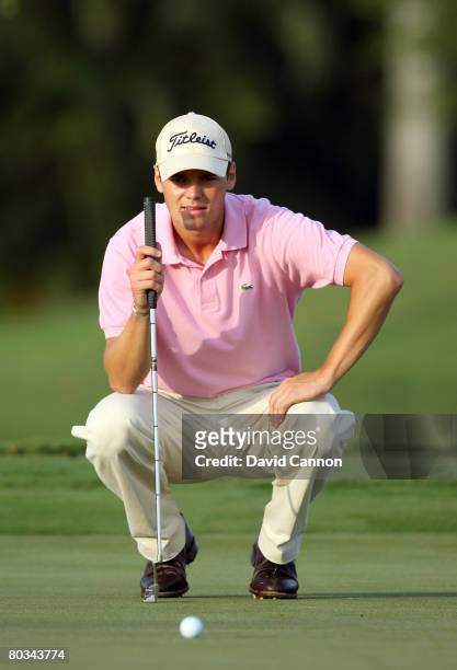 Martin Kaymer of Germany lines up a putt at the 1st hole during the third round of the 2008 World Golf Championships CA Championship at the Doral...