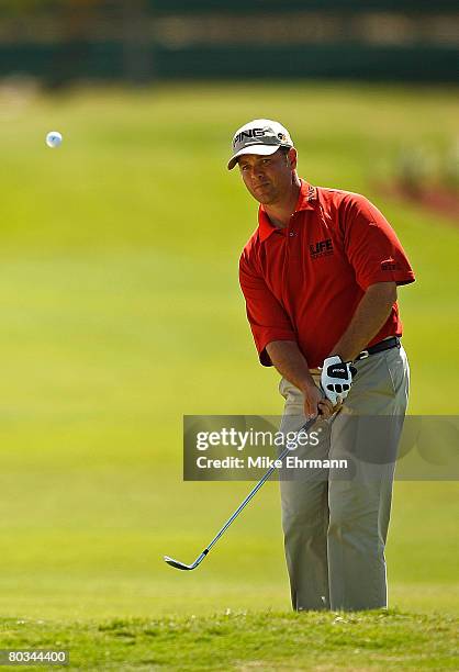 Ted Purdy chips to the green on the 12th hole during the third round of the Puerto Rico Open presented by Banco Popular held on March 22, 2008 at...