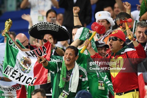 Mexico supporters cheer during the 2017 FIFA Confederations Cup semi-final football match between Germany and Mexico at the Fisht Stadium in Sochi on...
