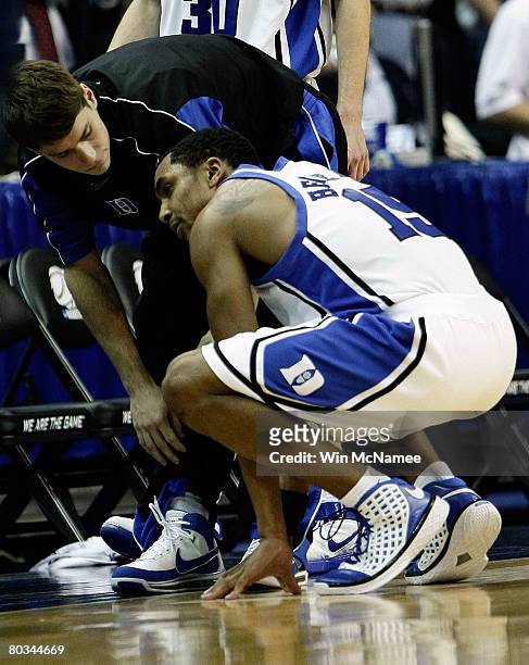 Gerald Henderson of the Duke Blue Devils reacts after losing against the West Virginia Mountaineers during the second round of the West Regional as...
