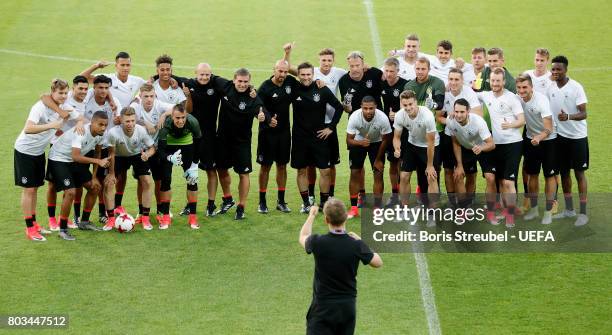 Head coach Stefan Kuntz of Germany and his team pose for a teamphoto during the MD-1 training session of the U21 national team of Germany at Krakow...