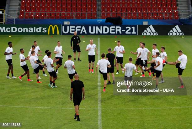 The team of Germany warm up during the MD-1 training session of the U21 national team of Germany at Krakow stadium on June 29, 2017 in Krakow, Poland.