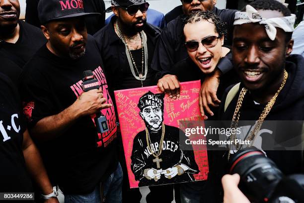 Friends and admirers of Prodigy gather outside of the Frank E. Campbell Funeral Chapel in New York City for the hip hop icon's funeral on June 29,...