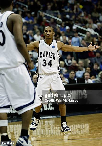 Stanley Burrell of the Xavier Musketeers reacts after a play against the Purdue Boilermakers during the second round of the West Regional as part of...