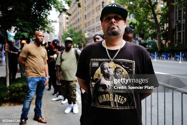 Friends and admirers of Prodigy gather outside of the Frank E. Campbell Funeral Chapel in New York City for the hip hop icon's funeral on June 29,...