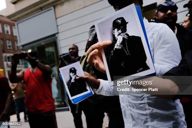 Friends and admirers of Prodigy gather outside of the Frank E. Campbell Funeral Chapel in New York City for the hip hop icon's funeral on June 29,...