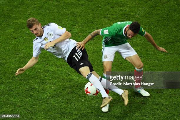 Timo Werner of Germany is challenged by Miguel Layun of Mexico during the FIFA Confederations Cup Russia 2017 Semi-Final between Germany and Mexico...