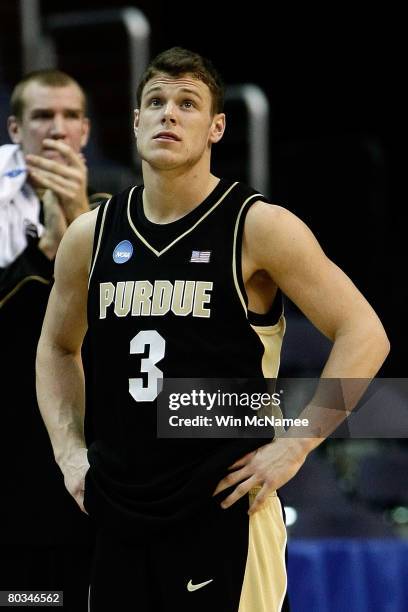 Chris Kramer of the Purdue Boilermakers looks on after fouling out of the game against the Xavier Musketeers during the second round of the West...