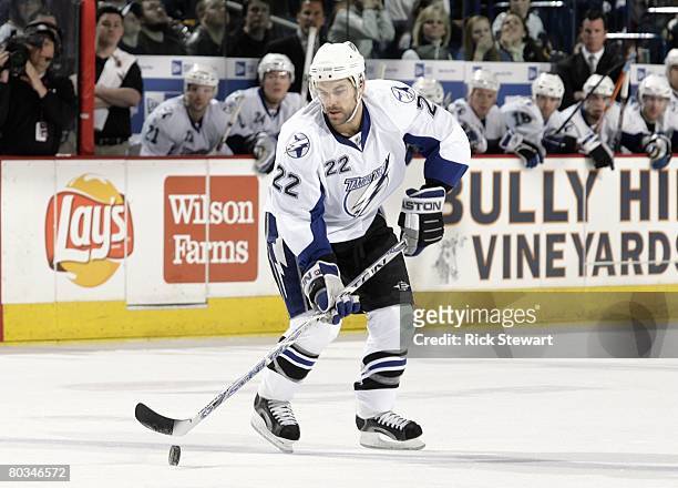 Dan Boyle of the Tampa Bay Lightning controls the puck during the game against the Buffalo Sabres on March 19, 2008 at HSBC Arena in Buffalo, New...