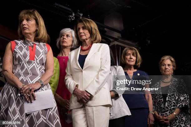 Rep. Jackie Speier , Rep. Katherine Clark , Minority Leader Nancy Pelosi , Rep. Susan Davis , and Rep. Jan Schakowsky look on during a press...