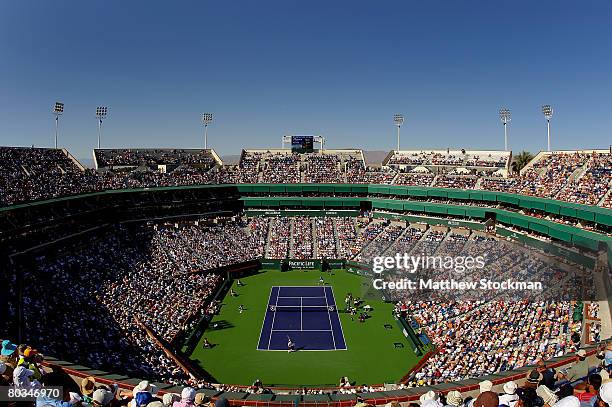 An overhead view of the stadium as Mardy Fish serves to Roger Federer of Switzerland during the men's semi final at the Pacific Life Open at the...