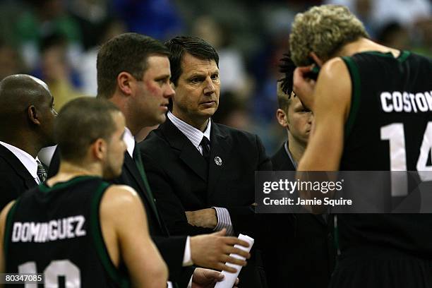 Head coach Ken Bone of the Portland State Vikings huddles with his players during a timeout against the Kansas Jayhawks during the Midwest Region...