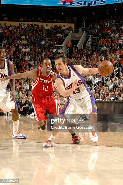 Steve Nash of the Phoenix Suns drives against Rafer Alston of the Houston Rockets in an NBA game played at U.S. Airways Center March 22, 2008 in...