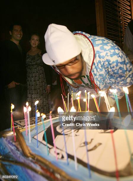 Cash Warren, from left, actress Jessica Alba and NBA player Baron Davis attends Davis' birthday at Stone Rose Lounge on March 22, 2008 in Beverly...