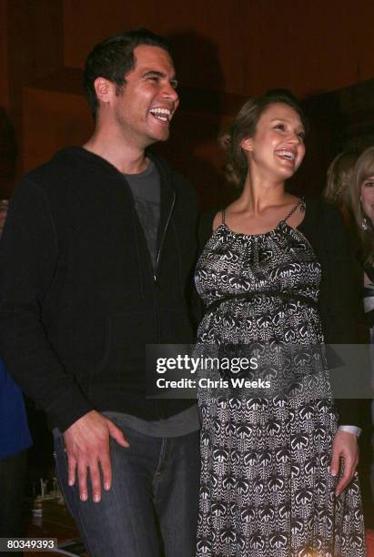 Cash Warren, left, and actress Jessica Alba attend NBA player Baron Davis' birthday at Stone Rose Lounge on March 22, 2008 in Beverly Hills, CA.