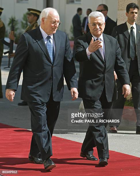 Palestinian leader Mahmoud Abbas welcomes US Vice-President Dick Cheney at the Palestinian Authority's headquarters in Ramallah on March 23, 2008....