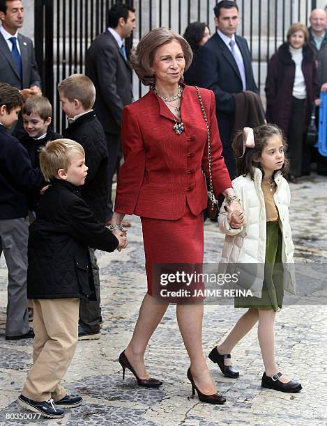 Spain's Queen Sofia holds her grand children Victoria Federica and Pablo after the traditional Mass of the Resurrection in Palma de Mallorca on March...