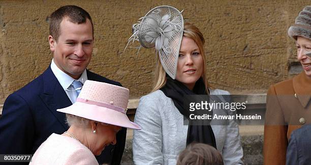 Queen Elizabeth ll, Peter Phillips, fiancee Autumn Kelly and Princess Anne leave St. George's Chapel in Windsor Castle following the Easter Day...