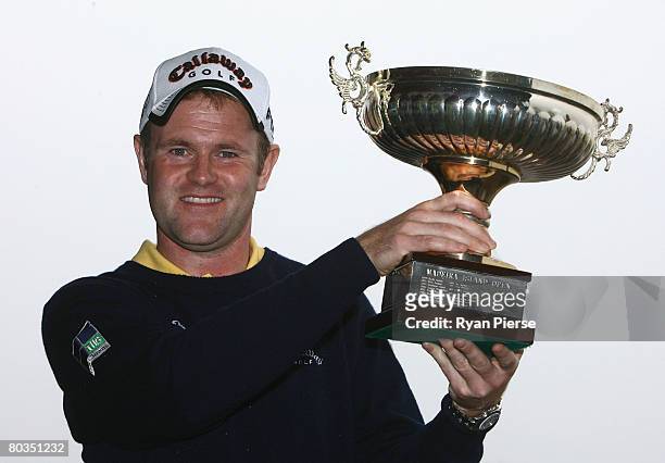 Alastair Forsyth of Scotland poses with his trophy after winning the Madeira Islands Open BPI 2008 at Clube De Golf Santo Da Serra on March 23, 2008...