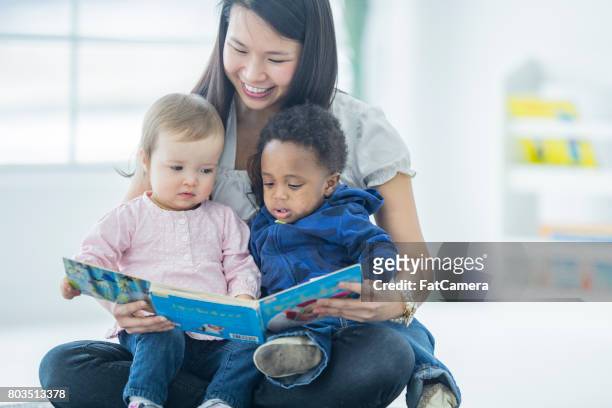 reading time - nanny stock pictures, royalty-free photos & images