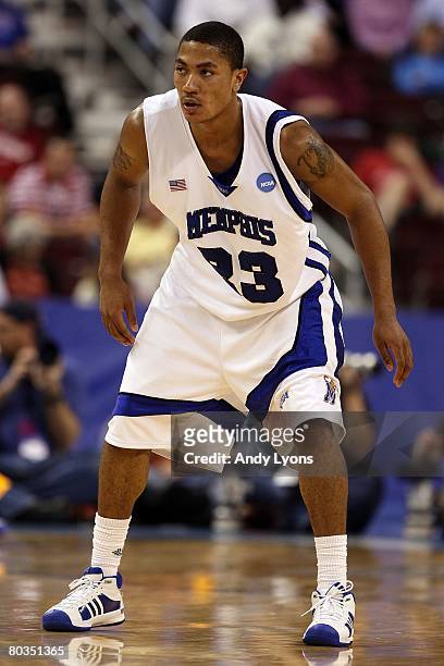Derrick Rose of the Memphis Tigersplays defense against the Texas-Arlington Mavericks during the first round of the South Regional as part of the...