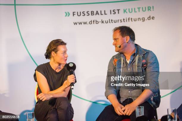 Of Matt Sports Katja Kraus and President of St. Pauli Oke Goettlich talk during the DFB Culture Foundation - Jubilee Meeting at Millerntor Stadium on...