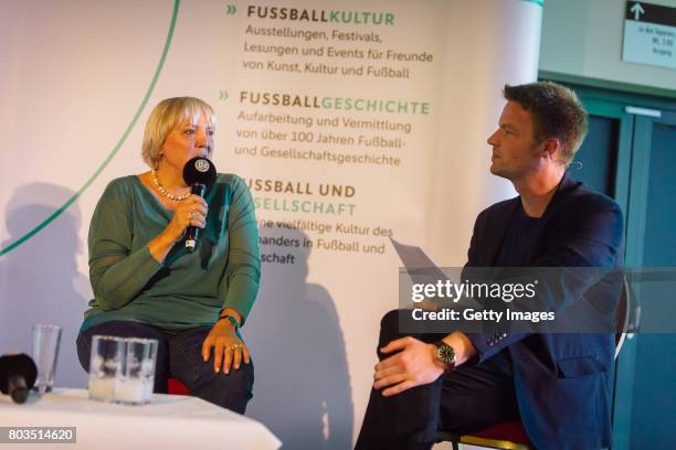 Vice President of the German Parliament Claudia Roth and Host Ronny Blaschke talk during the DFB Culture Foundation - Jubilee Meeting at Millerntor...