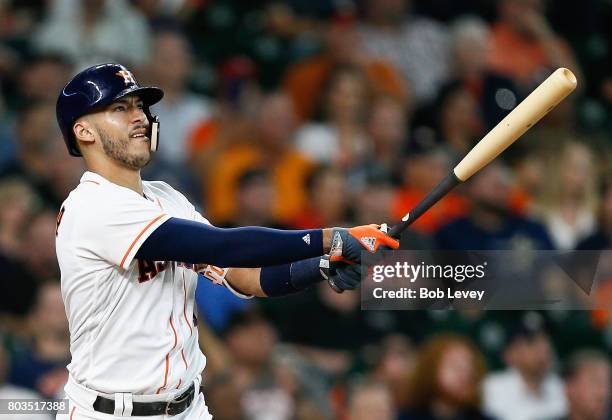 Carlos Correa of the Houston Astros hits a two-run home run in the fourth inning against the Oakland Athletics at Minute Maid Park on June 29, 2017...