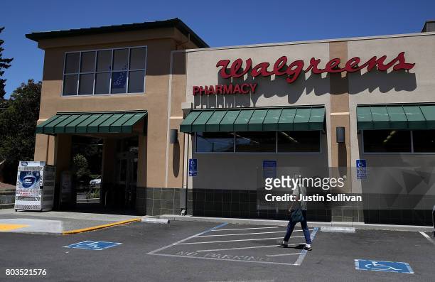 Customer enters a Walgreens store on June 29, 2017 in San Anselmo, California. Walgreens Boots Alliance Inc reported better than expected first...