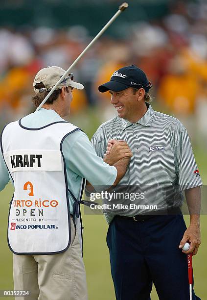 Greg Kraft is congratulated by his caddie after winning the Puerto Rico Open presented by Banco Popular held on March 23, 2008 at Coco Beach Golf &...