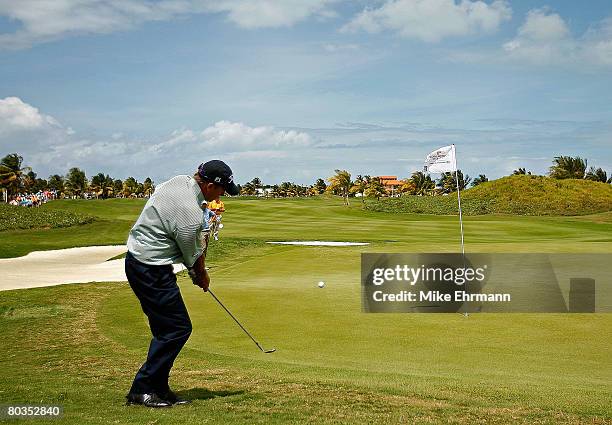 Greg Kraft chips to the green on the 12th hole during the final round of the Puerto Rico Open presented by Banco Popular held on March 23, 2008 at...