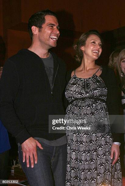 Cash Warren, left, and actress Jessica Alba attend NBA player Baron Davis' birthday at Stone Rose Lounge on March 22, 2008 in Beverly Hills, CA.