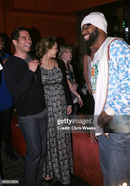 Cash Warren, from left, actress Jessica Alba and NBA player Baron Davis attends Davis' birthday at Stone Rose Lounge on March 22, 2008 in Beverly...